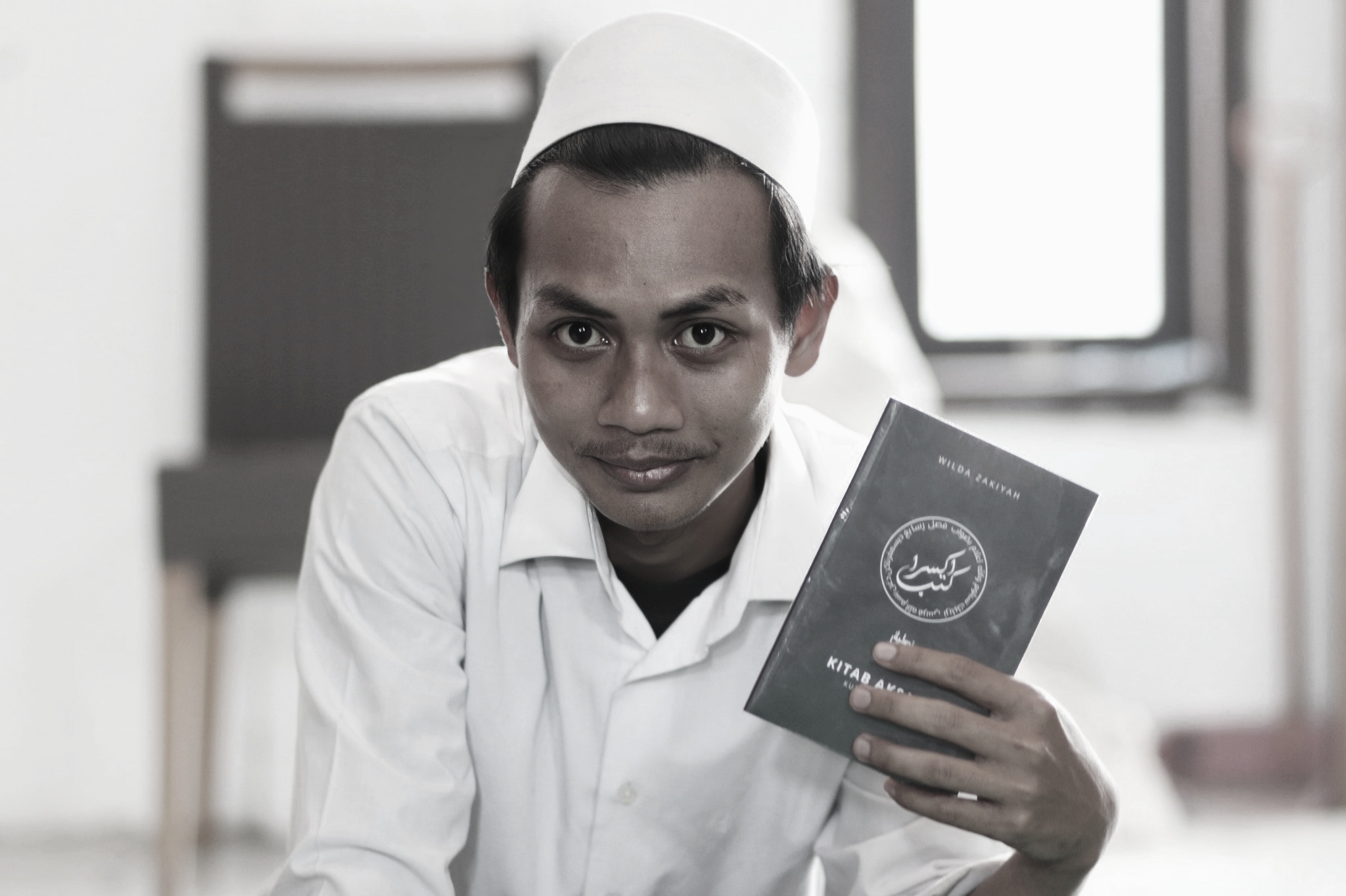 M. Akmal Marzuqin